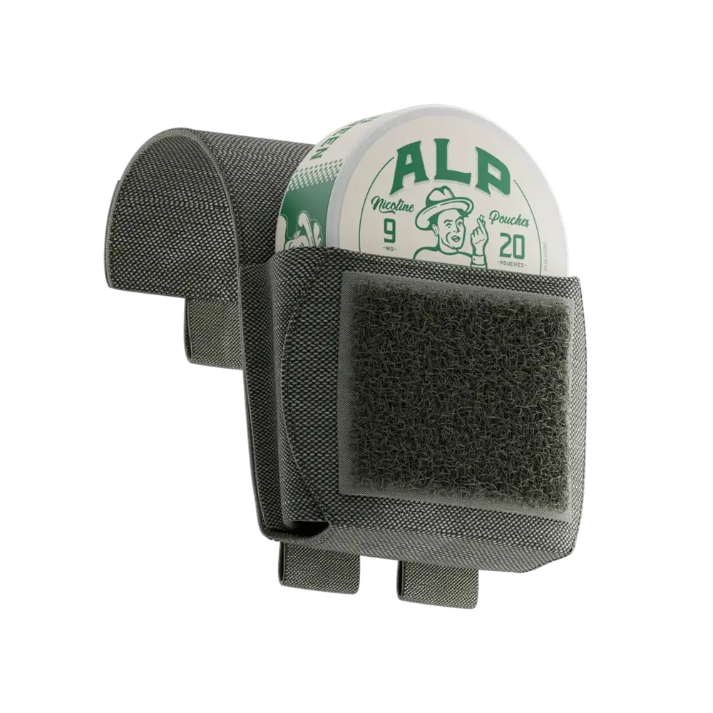 Mint nicotine pouch canister stored in a black tactical-style fabric holder with Velcro closure and belt attachment loops.