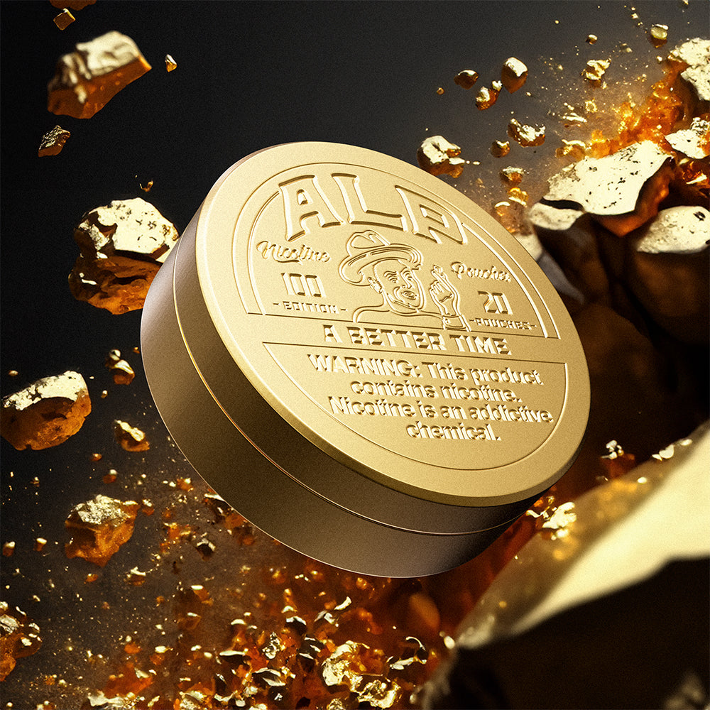 Gold ALP nicotine pouches tin with embossed branding, surrounded by exploding gold fragments for a premium aesthetic.